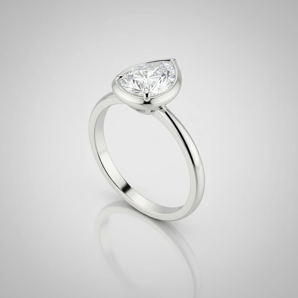 Elysian • Three Stone • Pear • Platinum